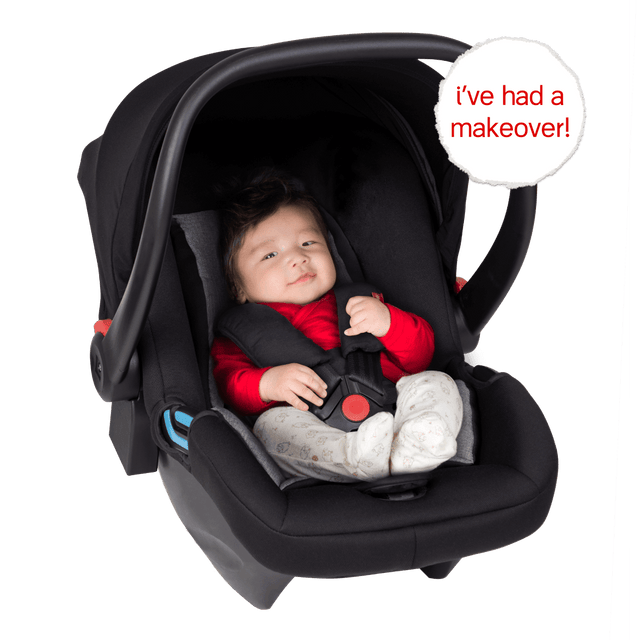 phil&teds alpha™ infant car seat représenté avec un joli bébé harnaché en toute sécurité dans la capsule_black/grey marl