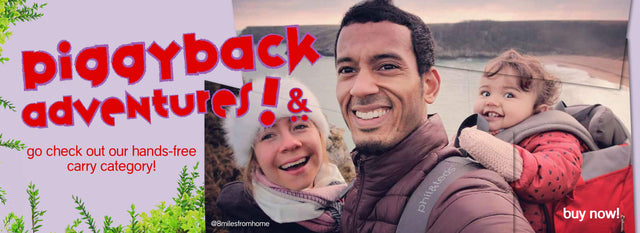 Man carries toddler in carrier backpack while taking a family selfie - coastal trek with escape™ child carrier from philandteds - @8milesfromhome