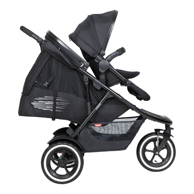 phil&teds inline  sport  silla de paseo con double kit en el frente y un asiento de sling en el piso para el recién nacido